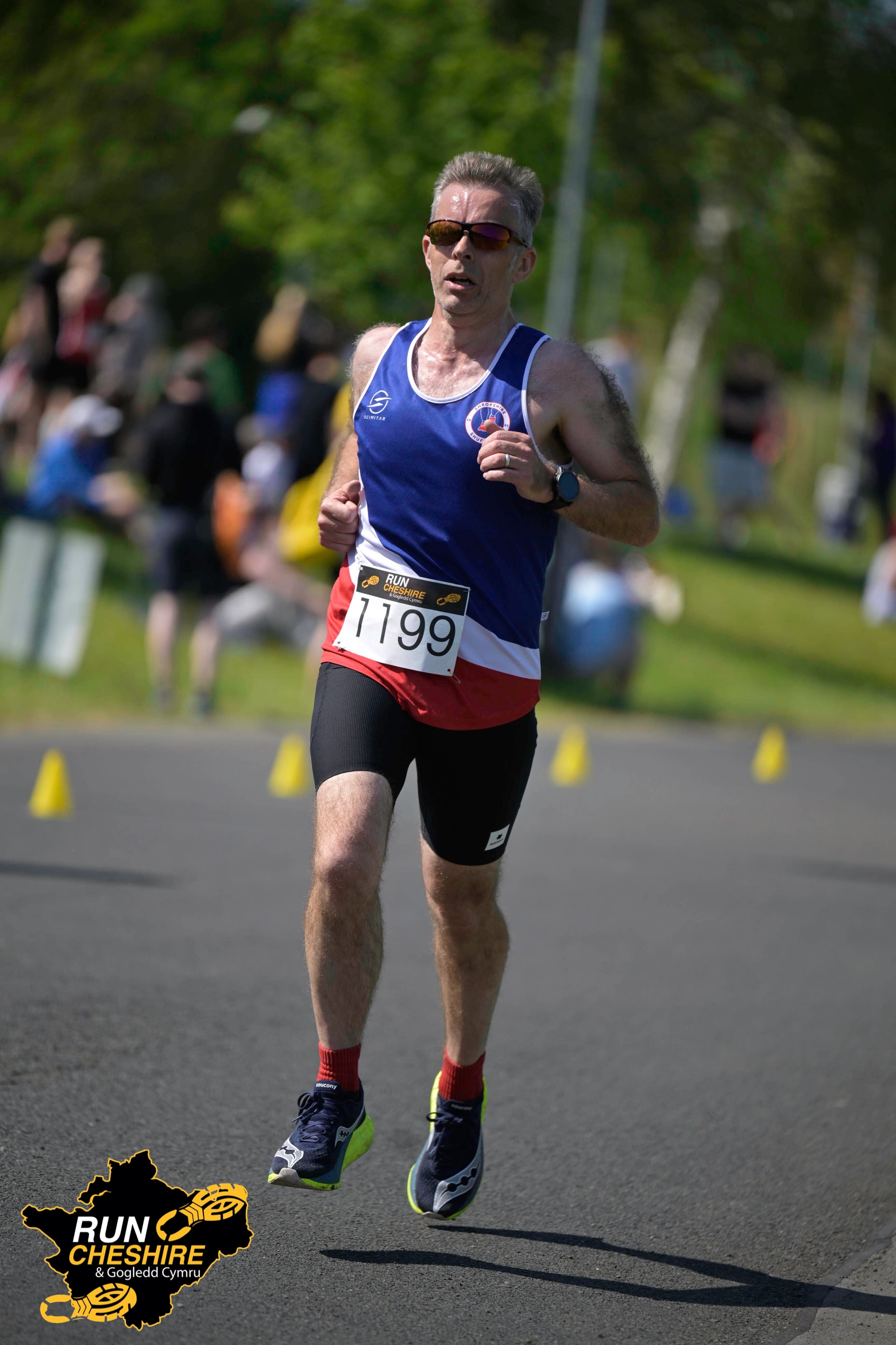 Glenn Foster wearing a running club shirt